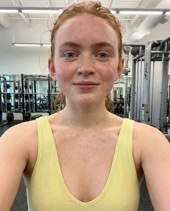 Sweaty and flushed high-angle fitness selfie