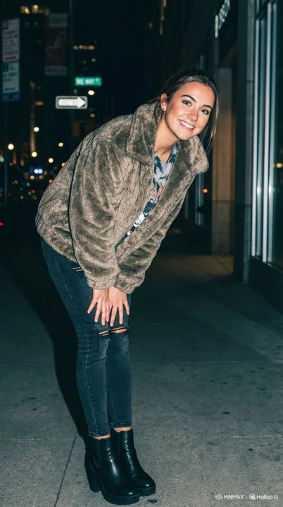 Cute girl street photography under the flashlights at night