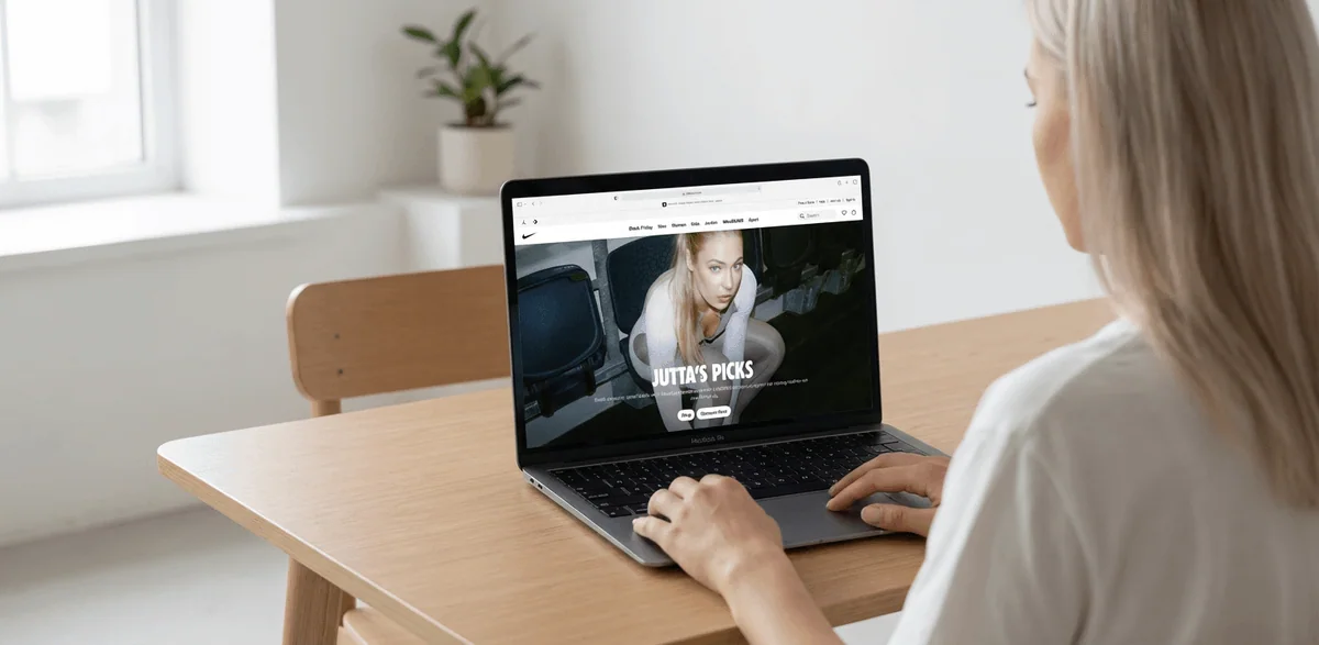Female back view using a computer in a minimalist space