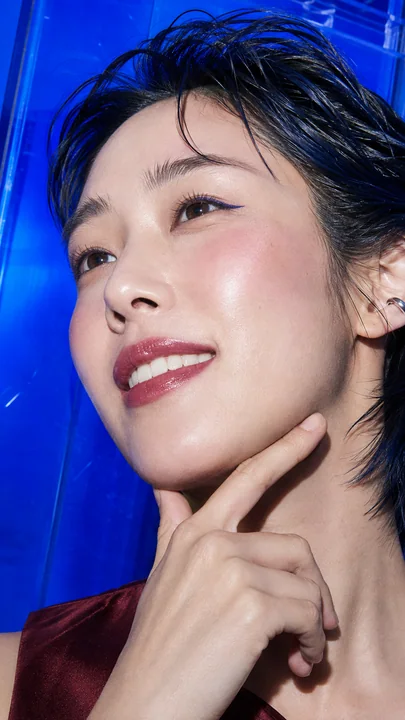 Korean-style makeup advertisement, macro shot, hard flash, berry-toned portrait