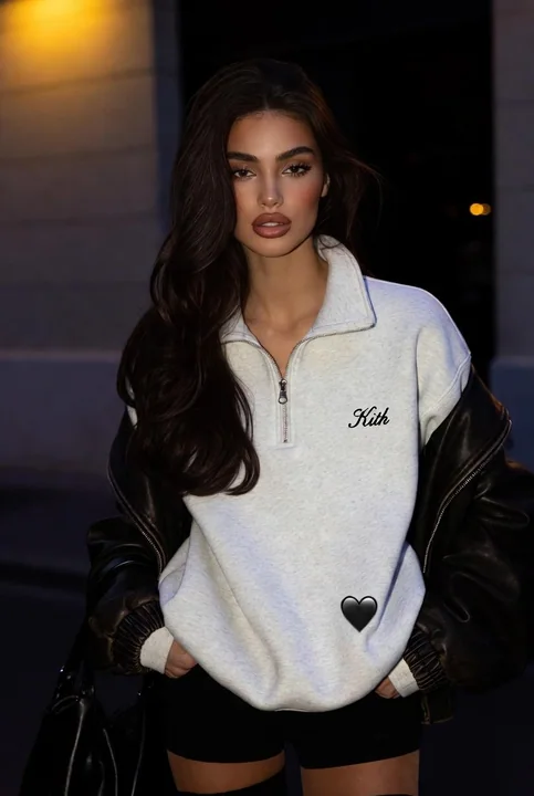 Fashion silhouettes in the night of Paris, high-end street style with leather jacket and hoodie mix.