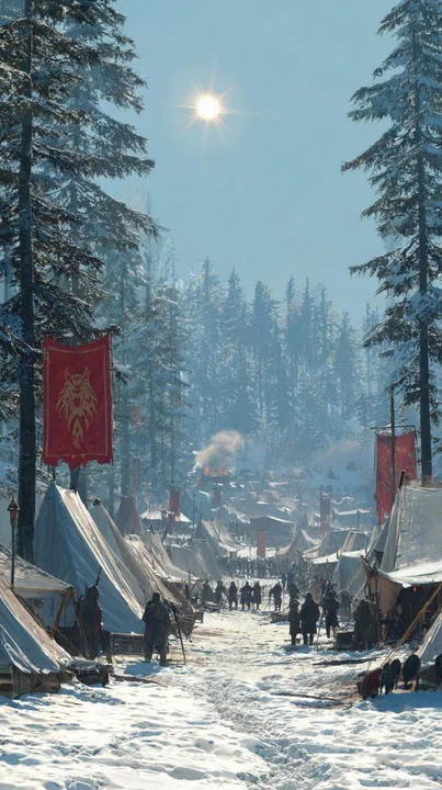 Grand realistic medieval camp at the edge of the frozen forest