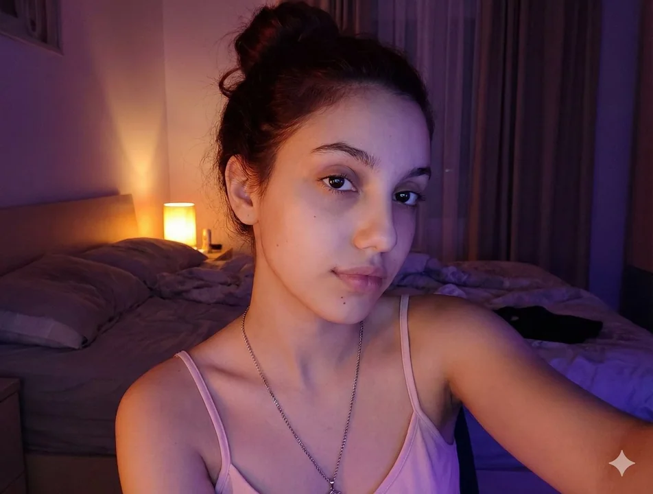 A captivating late-night bedroom selfie with interwoven warm and cool light and shadow